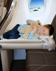 Child sleeping on the airplane bed Flyaway Kids Bed